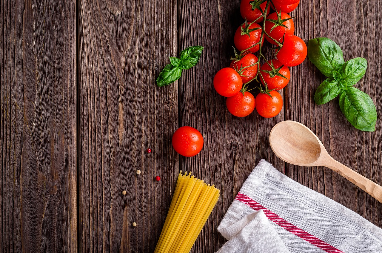 pasta tomatoes spoon basil